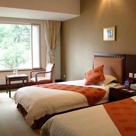 Suzhou Taoyuan International Holiday Hotel Pokoj fotografie