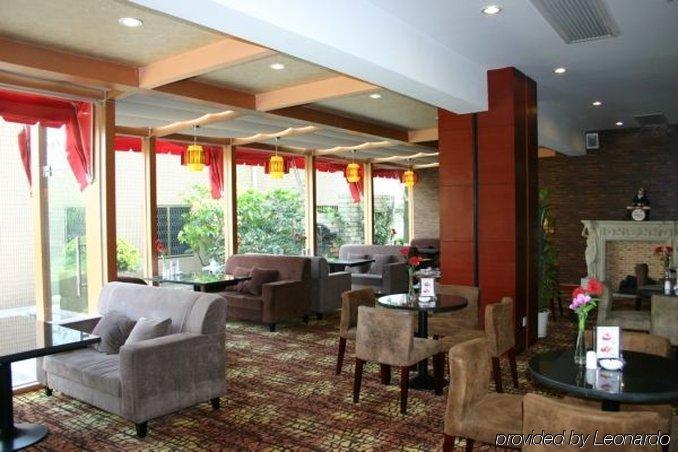 Suzhou Taoyuan International Holiday Hotel Restaurace fotografie